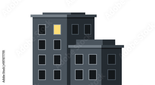 A grey multi-story apartment building features rows of dark windows with one single bright yellow light shining from a room on the upper level floor.