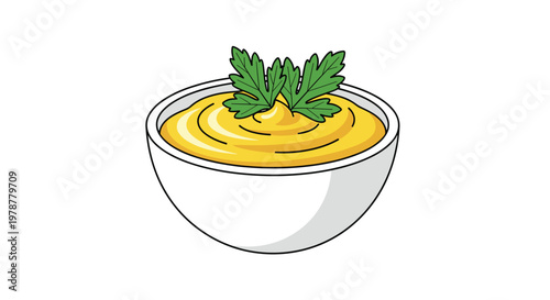 A pristine white ceramic bowl contains a generous serving of creamy yellow mustard garnished with a fresh sprig of green parsley on a white background.