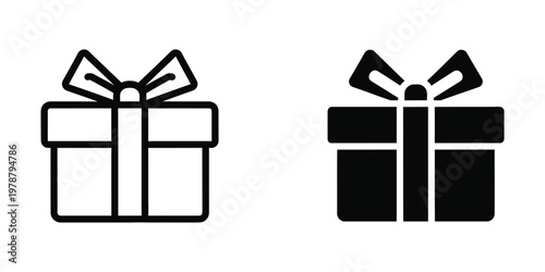 Contrast between a white gift box and a black gift box with identical ribbon bows