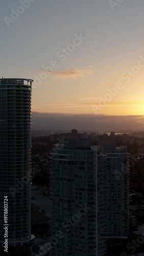 Aerial View of Golden Sunset on Modern High-Rise Buildings in New Westminster, British Columbia, Canada