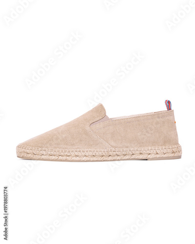 Beige canvas espadrille shoe side view isolated on white