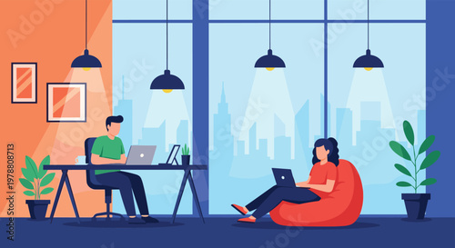 Two creative professionals working on laptops in a spacious modern office featuring large windows and comfortable seating.