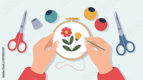 person embroidering flowers on fabric with sewing tools  hobby and leisure activity