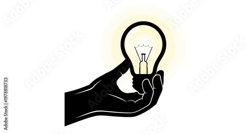 Hand holding light bulb with glowing effect.