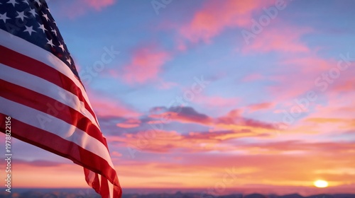 Flags Wave on the Beach as the Sun Sets Over the Ocean in the Evening Sky