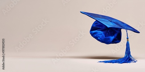 Graduation Cap Rests on a Simple Surface in a Bright Setting During the Celeb...