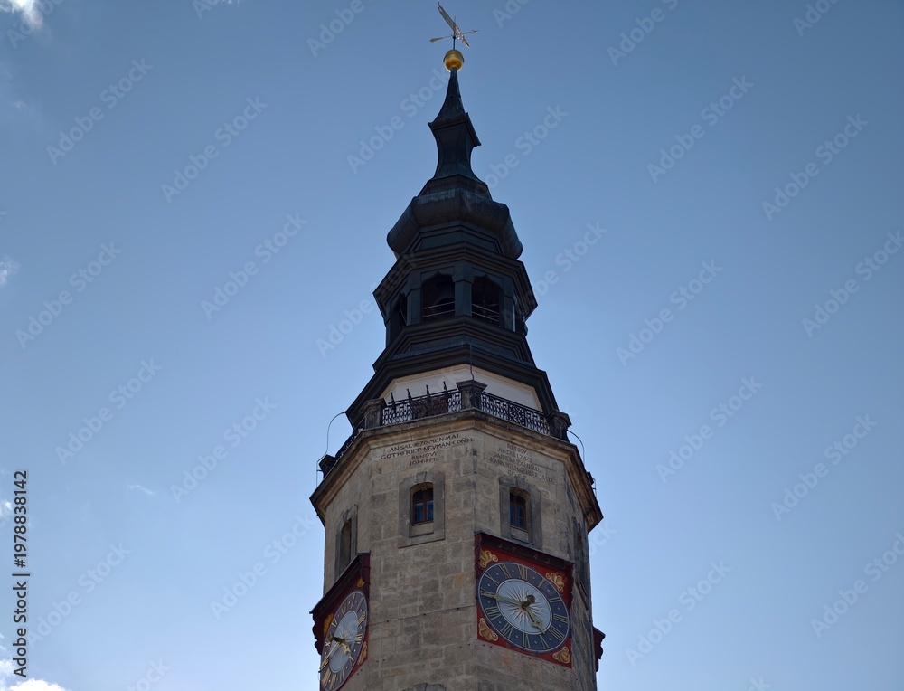 Obraz premium Majestic tower with timepiece. Skywardreaching ornate clock tower showcasing heritage and craftsmanship