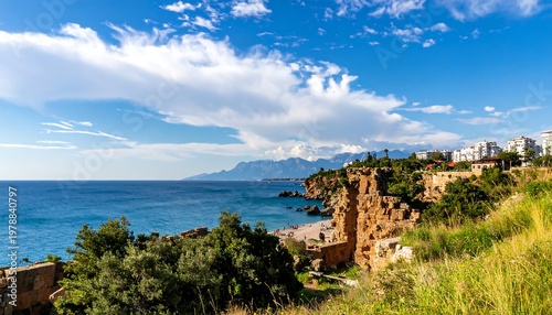 Coastal Cliffside View with Turquoise Waters and Blue Sky.