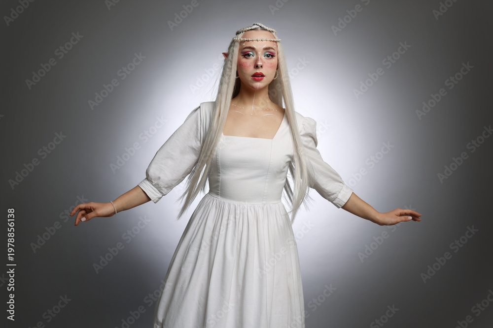 Naklejka premium Beautiful elf girl on grey gradient background