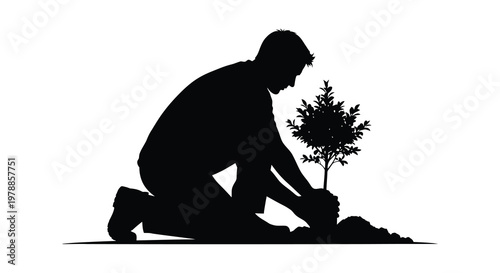 A man kneels to plant a small tree carefully tending to the seedling in a simple silhouette high quality professional detailed