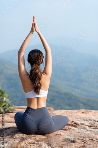 Person Sits and Meditates by a Calm Lake Surrounded by Trees in the Morning