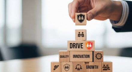 Building a foundation of business principles with cardboard blocks and logos