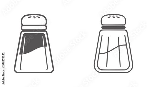 Two stylized salt and pepper shakers one filled one empty condiment kitchen