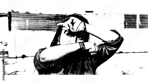 Photos A woman in a dark saree covering her face with her hands in a black and white ph