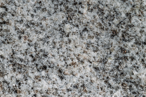 Cuadro en lienzo Gros plan sur la texture d'un granite naturel gris et noir moucheté