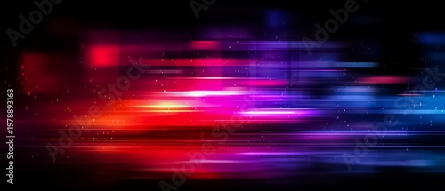 Colorful, blurry image of a cityscape with red, blue, and purple hues. The image has a dreamy, surreal quality to it