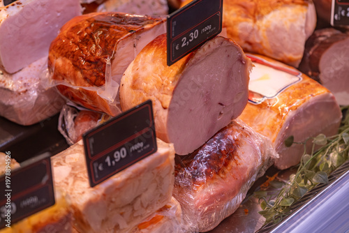 Konstfotografi Cooked ham display in deli counter supermarket meat selection