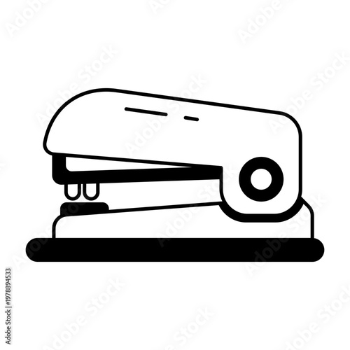 A glyph style icon showing a stapler