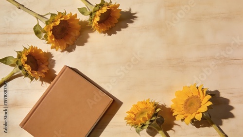 National Book Day celebration with sunflowers and a blank book cover