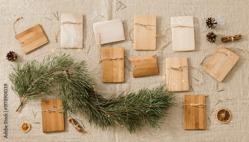 Minimalist Nordic advent calendar with wooden bags and pine branches