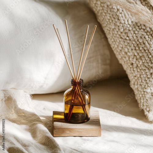 Aromatic Reed Diffuser in Brown Glass Bottle on Wooden Tray