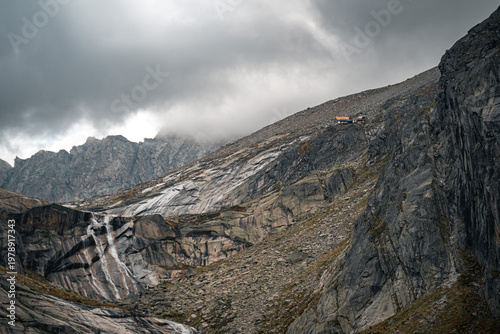 Gelmerhütte und Dichterbach  near Gelmersee in the Swiss Alps, ideal for nature and hiking themes
