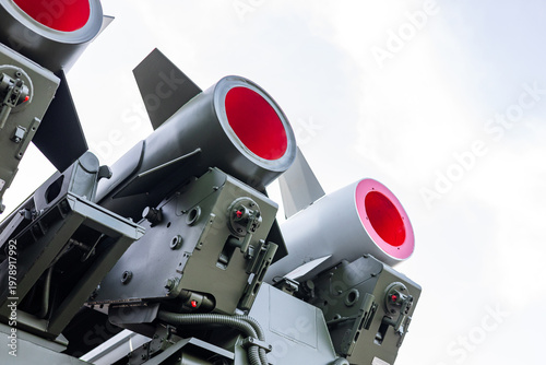 Military equipment and army equipment.. Detailed view showcasing security features of missile assembly components. Focusing on essential safety measures embedded within missile nozzle