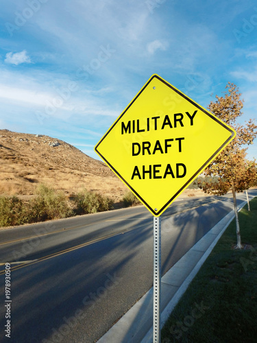 Military draft ahead warning sign on rural road