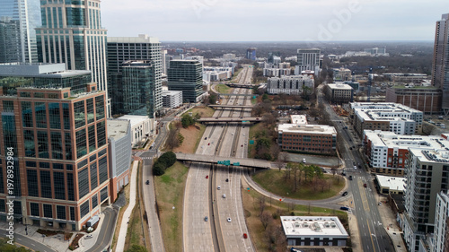 Canvastavla Drone view of Charlotte NC roadway corridor and modern city blocks