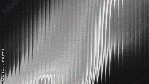 Ribbed glass background with abstract waves and glossy gradient textures in black and white, perfect for modern design, digital surfaces, decorative patterns, or minimal architectural theme