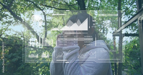 Standing Chinese girl wearing gray hooded sweatshirt raising hands near face on porch, with AR HUD