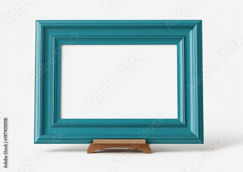 Ornate teal picture frame with wood stand on a white background