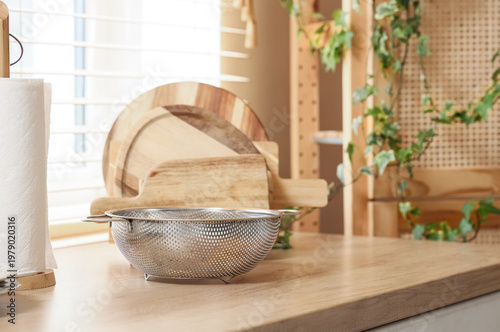 Metal sieve on counter in k...