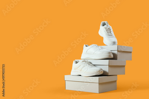 Shoe boxes with white sneak...