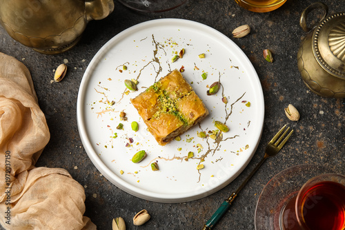 Plate with tasty baklava on...