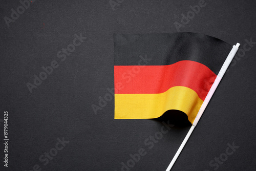Flag of Germany on black ba...