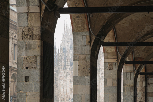 view of the downtown with people walking along the street during a raining January day
