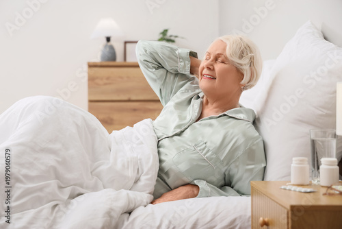 Morning of happy senior wom...