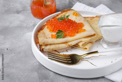 Delicious pancakes with red...