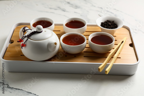 Tray with teapot and cups o...