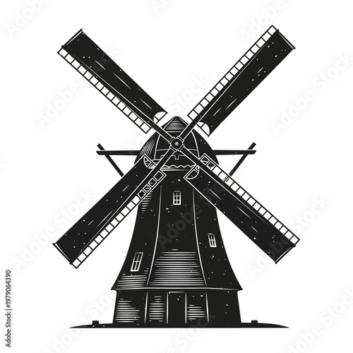 Vintage windmill with rotating blades in rural setting
