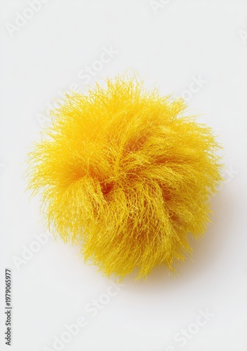 A bright yellow, fluffy, textured object resembling a burst of rays, isolated on white
