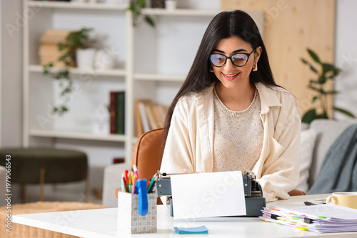 Female screenwriter using v...