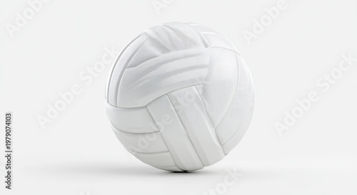 A clean, white volleyball rests on a smooth, bright white surface