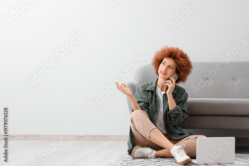 Redhead female freelancer w...