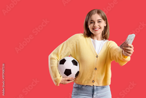 Happy young woman with socc...