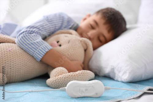 Little boy with toy bunny s...
