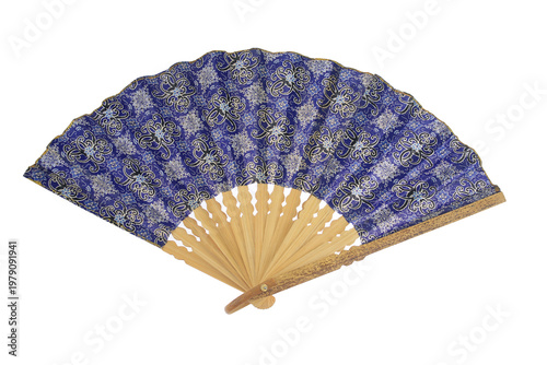 Elegant fan displays intricate blue and silver with batik pattern patterns. Wooden ribs offer classic structure, warmth. Fanned open, it reveals traditional craftsmanship. isolated on white background