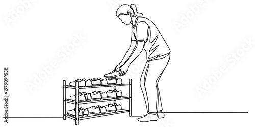A single continuous line drawing of a woman organizing shoes on a multi tiered storage rack unit