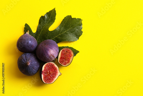 Fresh ripe purple figs with...